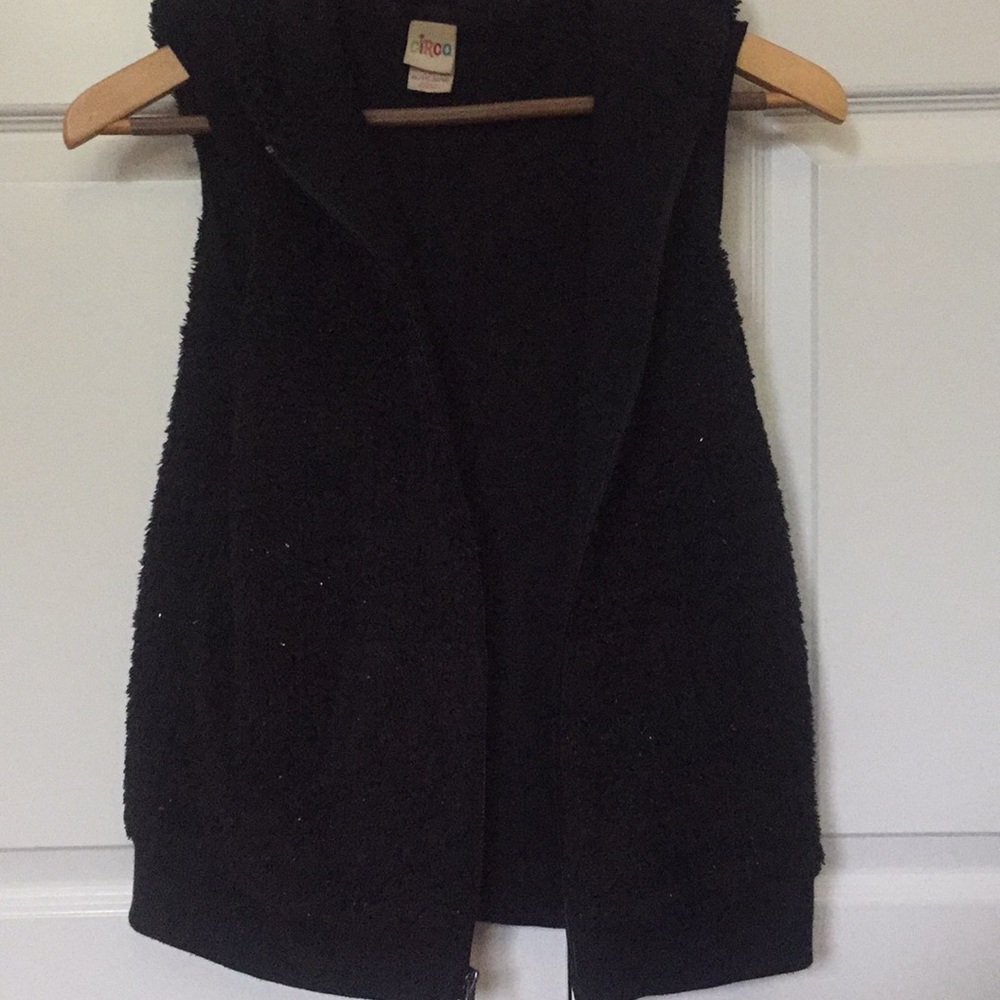 Black sleeveless sweater